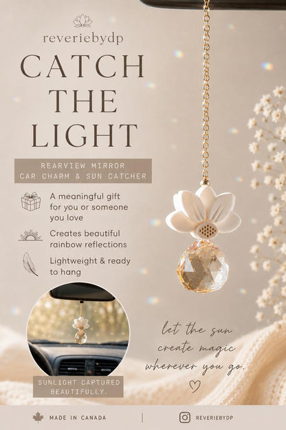 Reverie by DP gold-tone white lotus crystal car charm