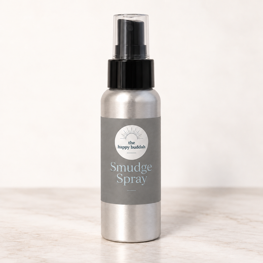 Happy Buddah Smudge Spray, silver bottle with soft gray label and steel-blue lettering